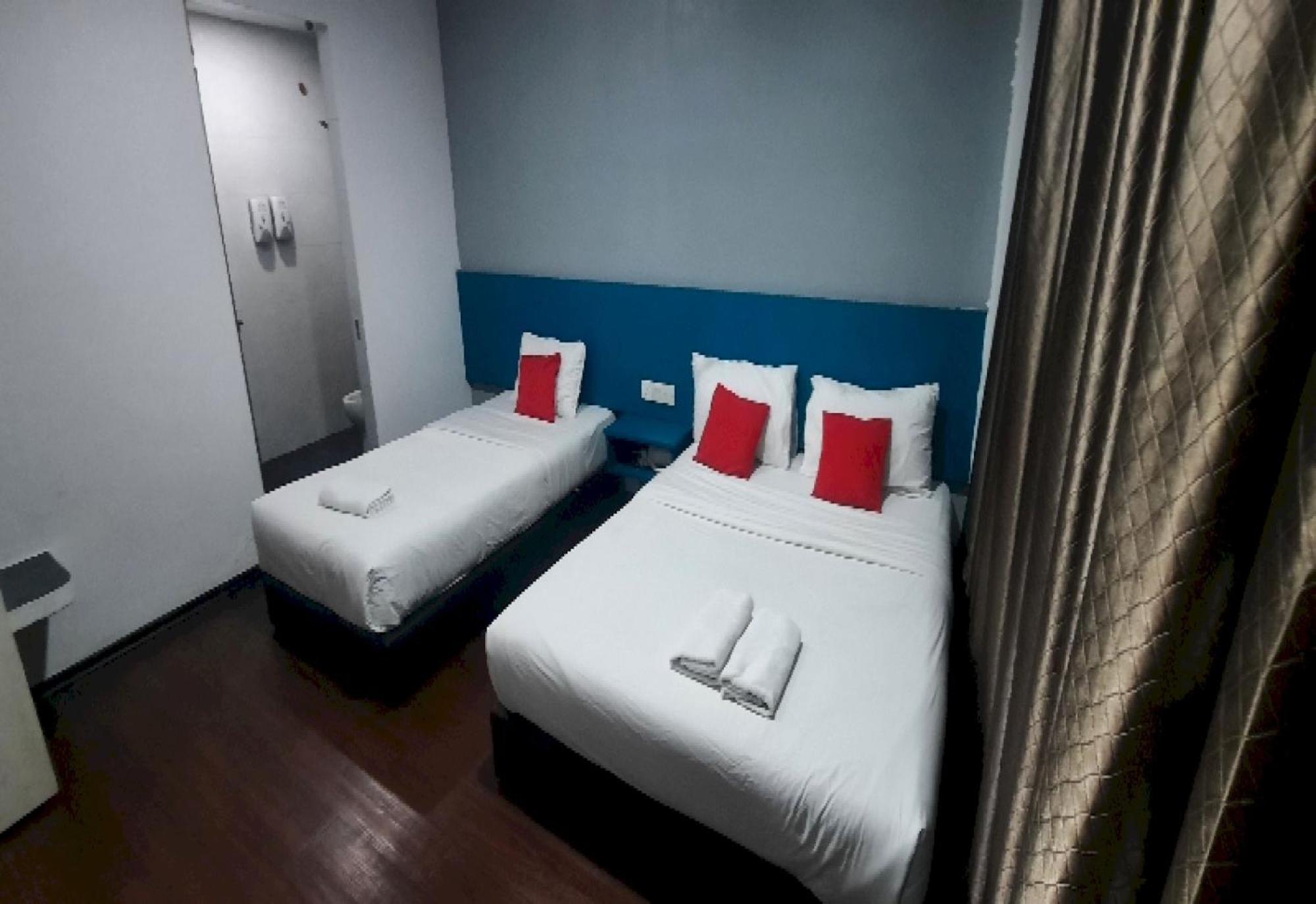 Super Oyo 90724 Rg Hotel Air Hitam Bagian luar foto