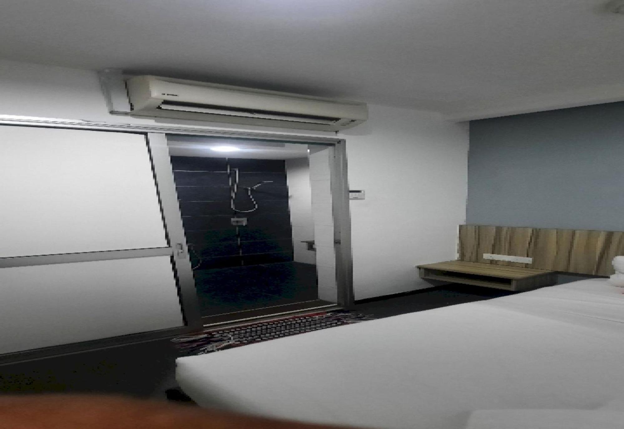 Super Oyo 90724 Rg Hotel Air Hitam Bagian luar foto