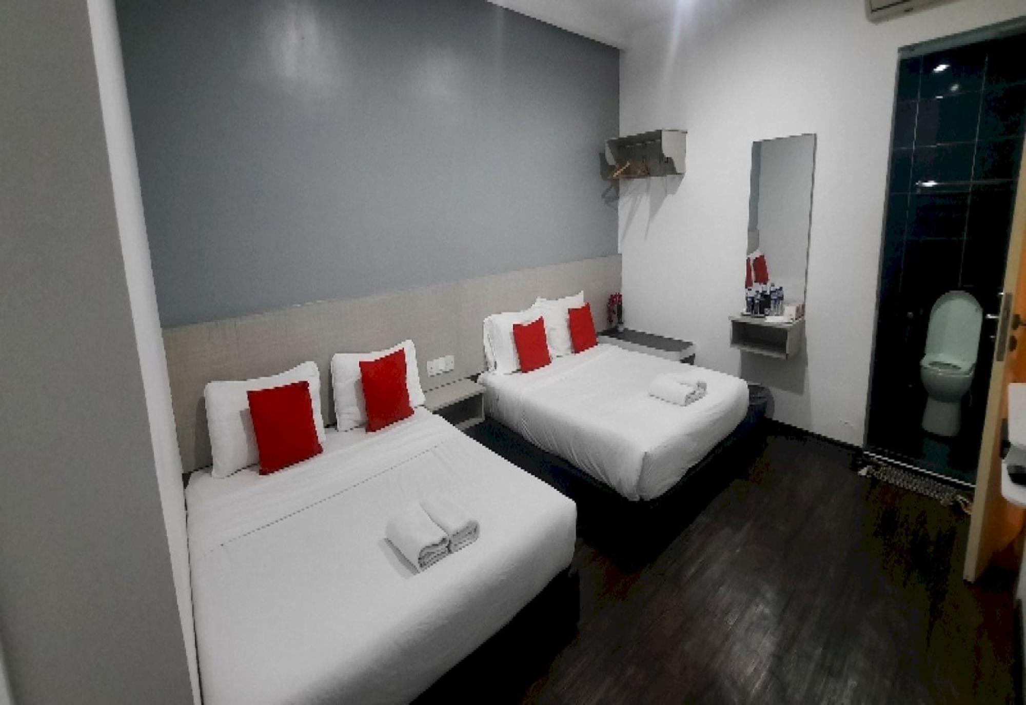 Super Oyo 90724 Rg Hotel Air Hitam Bagian luar foto