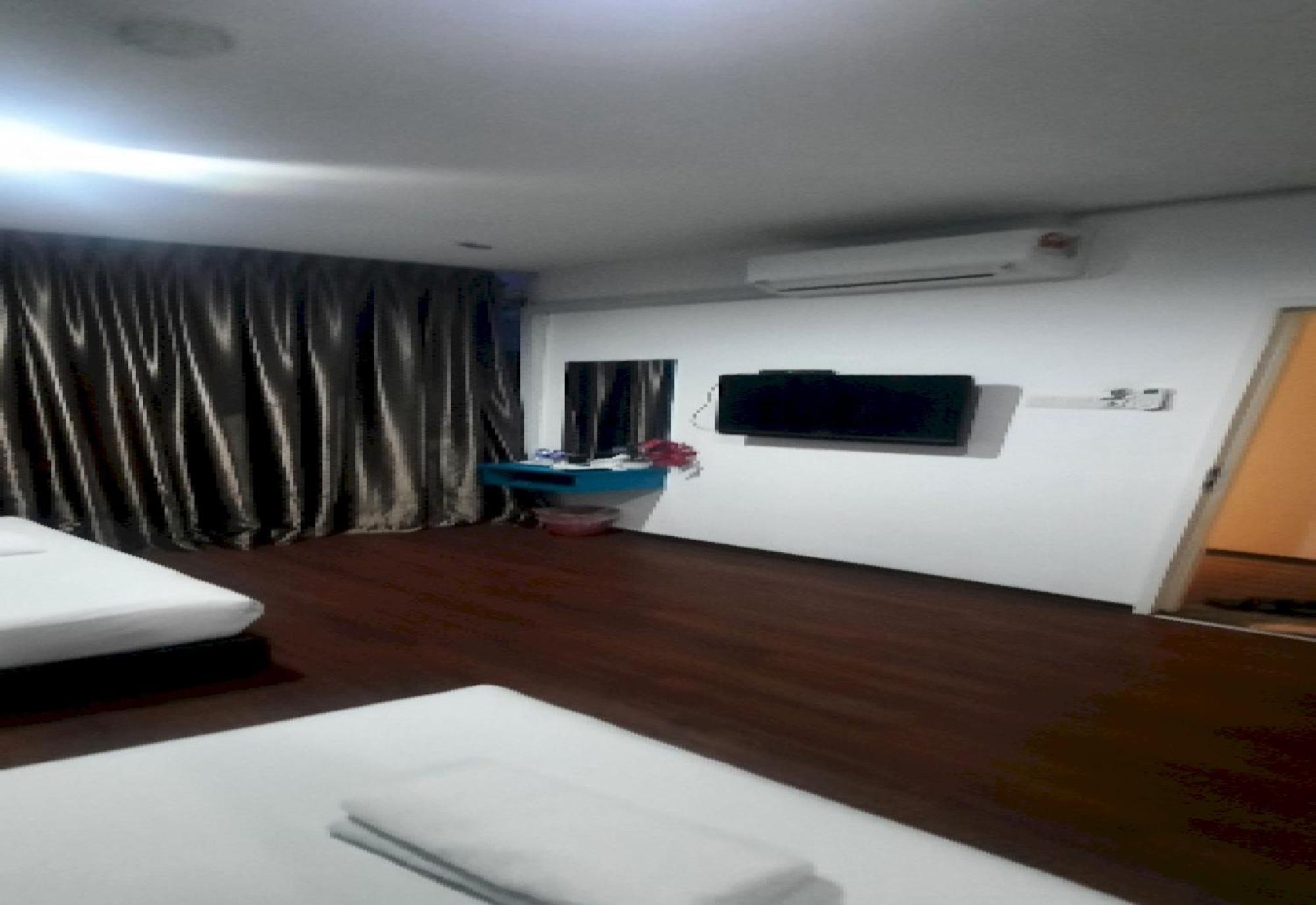 Super Oyo 90724 Rg Hotel Air Hitam Bagian luar foto